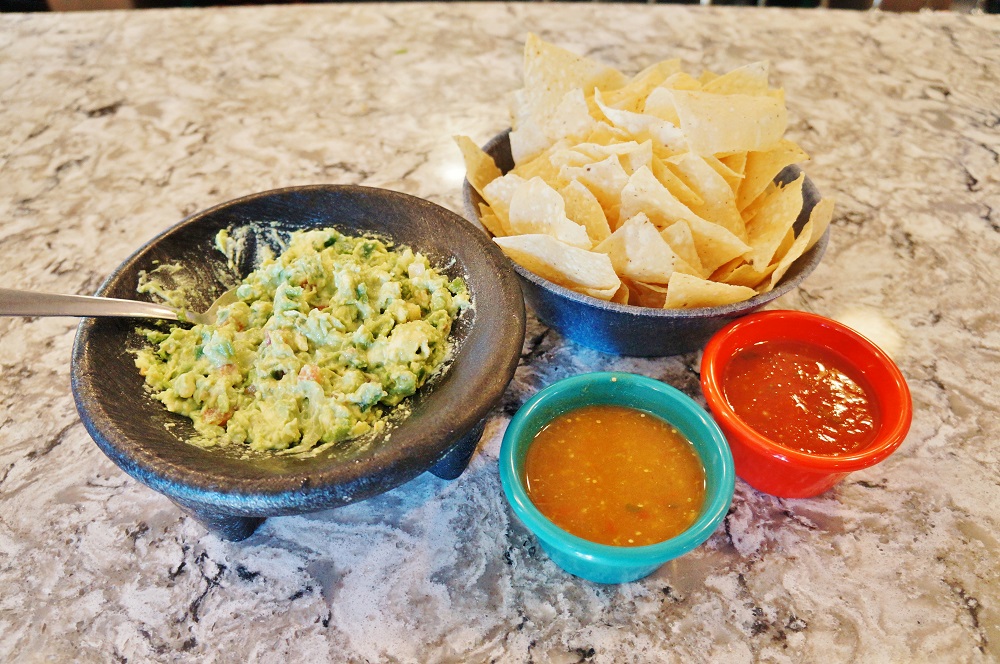 Top-shelf guacamole with chips and salsa