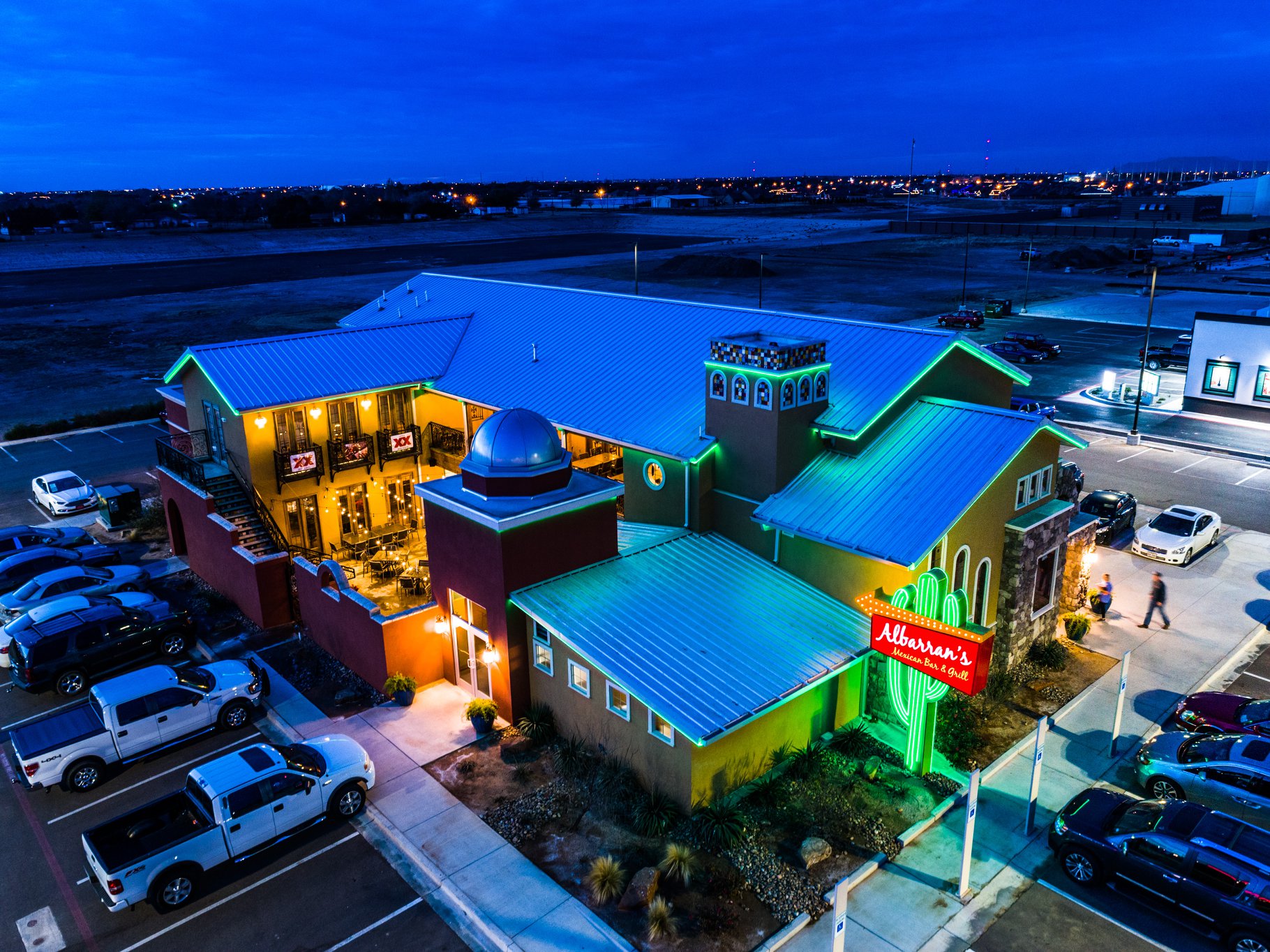 Albarran's Mexican Bar & Grill glowing at night in Lubbock